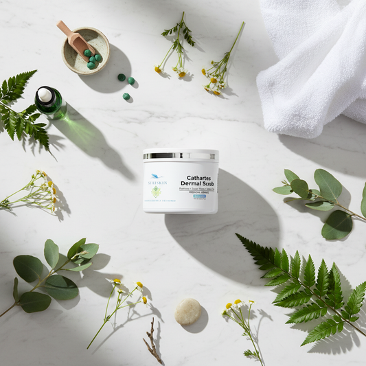 Cathartes Dermal Scrub flat lay with spa elements